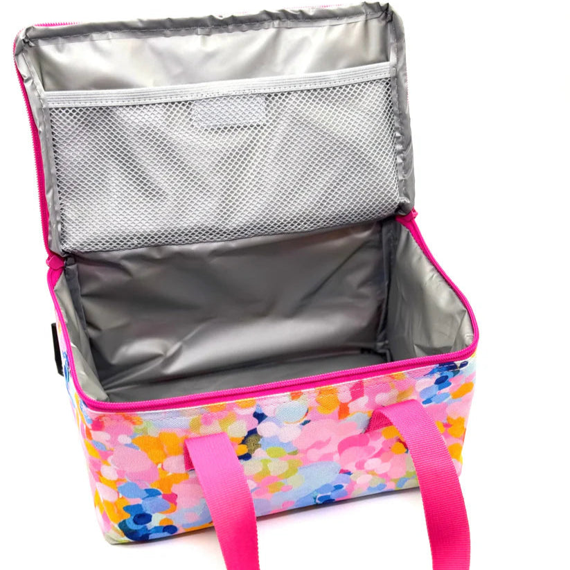 Colorful floral-patterned cooler bag with pink handles on a white background