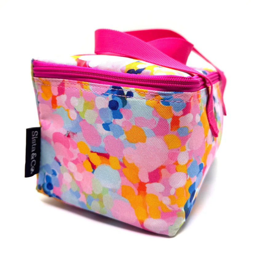 Colorful floral-patterned bag with a pink strap on a white background