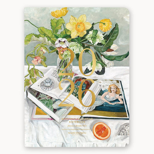 Notebook cover with floral design and vintage-style illustrations on a white background