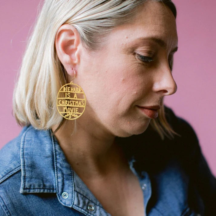 DENZ & CO- Die Hard Is a Christmas Movie earrings in Gold - DANGLE EARRINGS