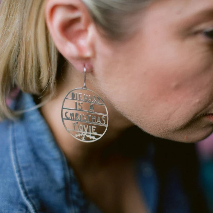 DENZ & CO- Die Hard Is a Christmas Movie earrings in Silver - DANGLE EARRINGS