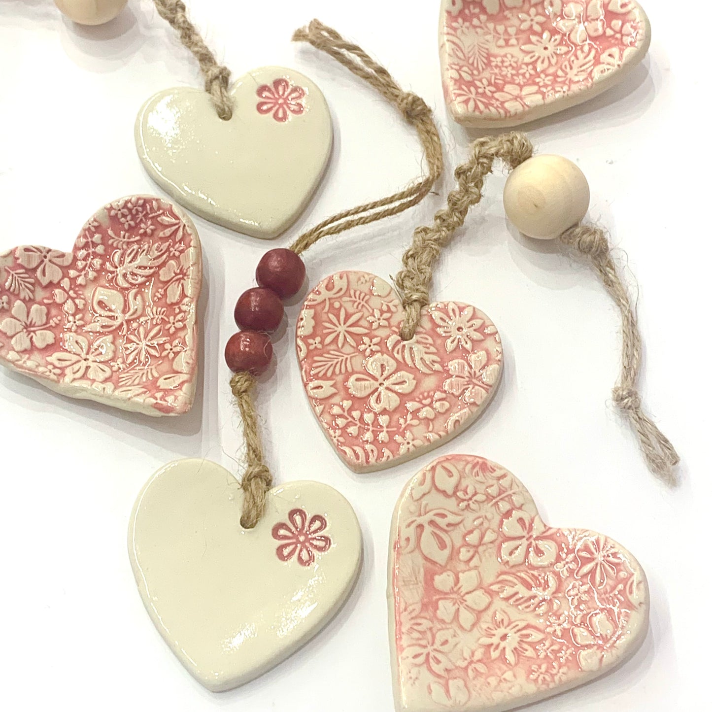 EARTH BY HAND- Clay Heart Decorations- Red Embossed & One Bead