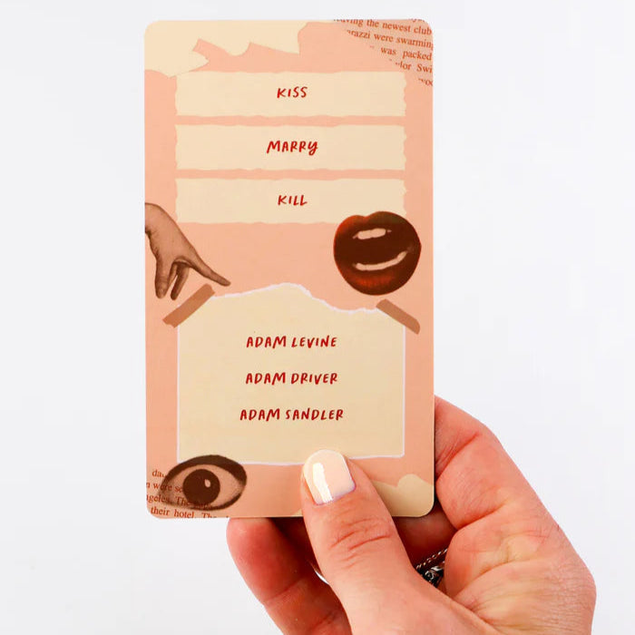 Hand holding a small card with text and illustrations on a white background