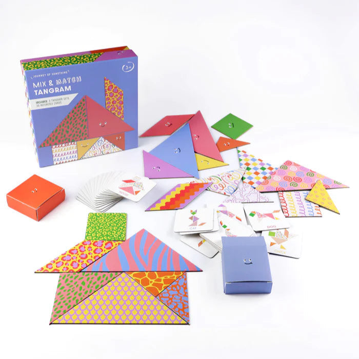 Colorful tangram set with packaging on a white background
