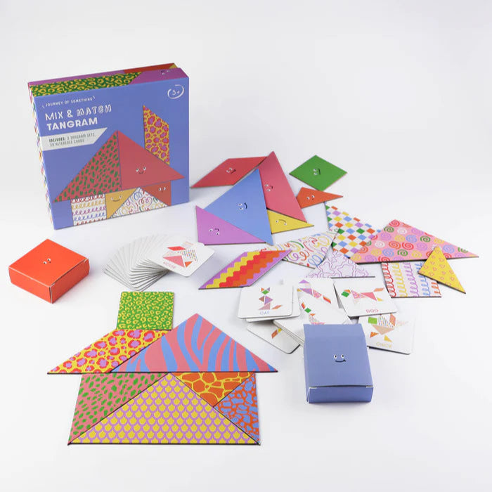 Colorful tangram set with packaging on a white background
