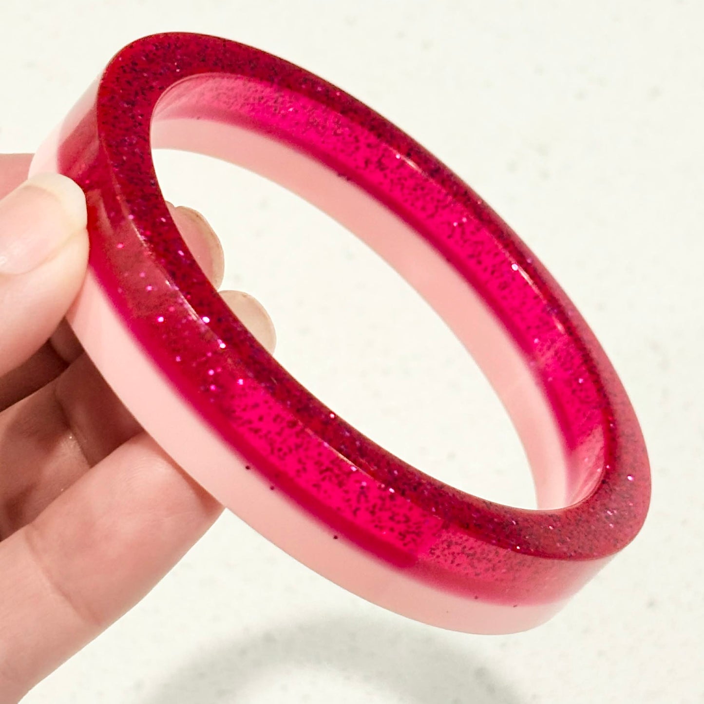 RAY BY DESIGN - Resin Bangle 2 Tone Pink Glitter Round
