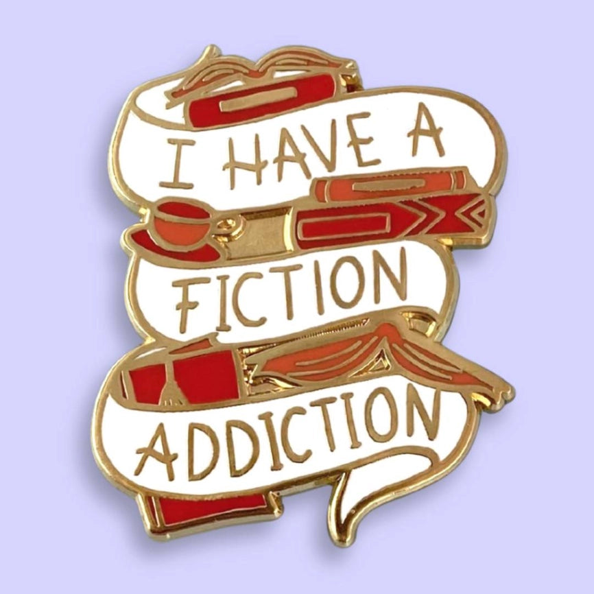 JUBLY-UMPH - "FICTION ADDICTION" LAPEL PIN